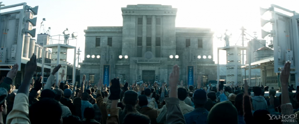 Rue’s district giving Katniss the 3-finger salute during the press tour in the second movie.